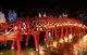 Vietnam: The red painted The Huc Bridge (Rising Sun or Sunbeam Bridge) leading to Den Ngoc Son or Jade Mountain Temple, Hoan Kiem Lake, Hanoi